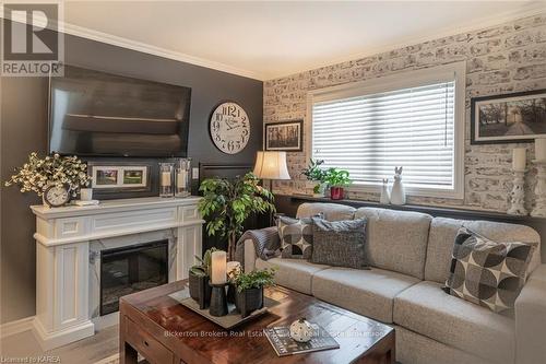 1101 - 237 Oak Street, Gananoque, ON - Indoor Photo Showing Living Room With Fireplace