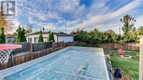 Above ground pool and backyard - 1049 Sovereign Road, Woodstock, ON - Outdoor