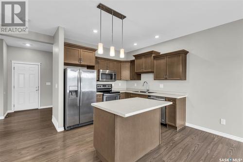 18 115 Veltkamp Crescent, Saskatoon, SK - Indoor Photo Showing Kitchen With Stainless Steel Kitchen With Double Sink