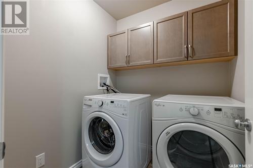 18 115 Veltkamp Crescent, Saskatoon, SK - Indoor Photo Showing Laundry Room