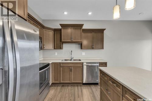 18 115 Veltkamp Crescent, Saskatoon, SK - Indoor Photo Showing Kitchen With Stainless Steel Kitchen