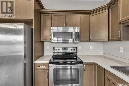 18 115 Veltkamp Crescent, Saskatoon, SK - Indoor Photo Showing Kitchen With Stainless Steel Kitchen