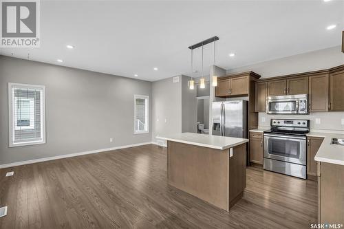 18 115 Veltkamp Crescent, Saskatoon, SK - Indoor Photo Showing Kitchen With Stainless Steel Kitchen