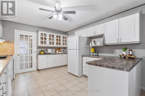 Kitchen from sunroom - 32 Hydro Street, London, ON 