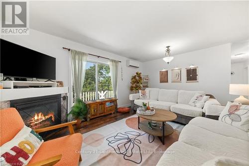 11807 Loyalist Parkway, Prince Edward County (Hallowell), ON - Indoor Photo Showing Living Room With Fireplace