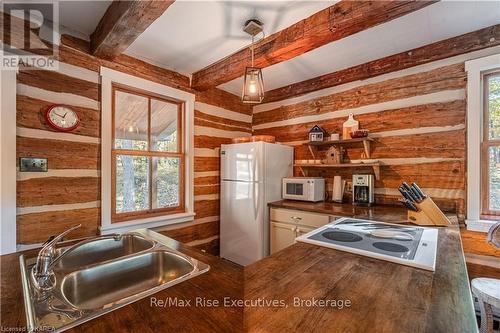 1245 Mcconville Lane, South Frontenac (Frontenac South), ON - Indoor Photo Showing Kitchen With Double Sink