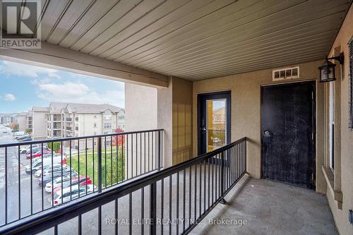 406 - 1350 Main Street E, Milton, ON - Outdoor With Balcony With Exterior