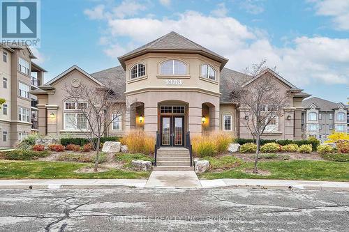 406 - 1350 Main Street E, Milton, ON - Outdoor With Facade