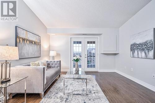 406 - 1350 Main Street E, Milton, ON - Indoor Photo Showing Living Room