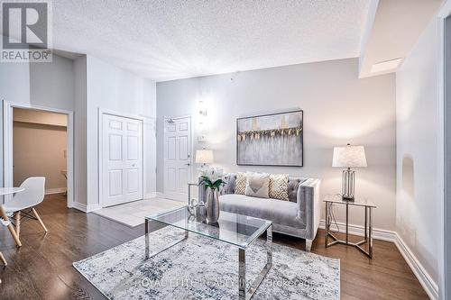 406 - 1350 Main Street E, Milton, ON - Indoor Photo Showing Living Room