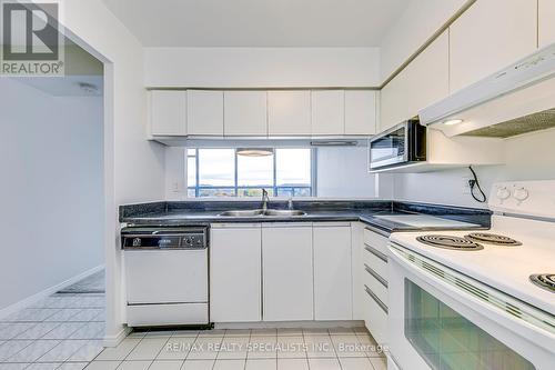 702 - 50 Kingsbridge Gardens, Mississauga, ON - Indoor Photo Showing Kitchen With Double Sink