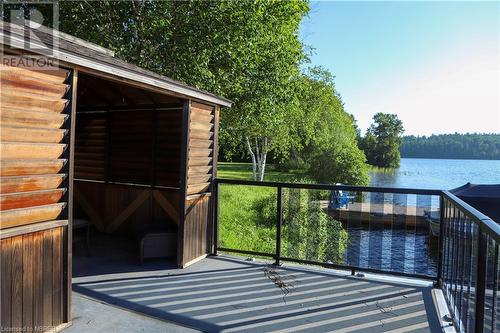 33 White Bear Court, Temagami, ON - Outdoor With Body Of Water With Exterior