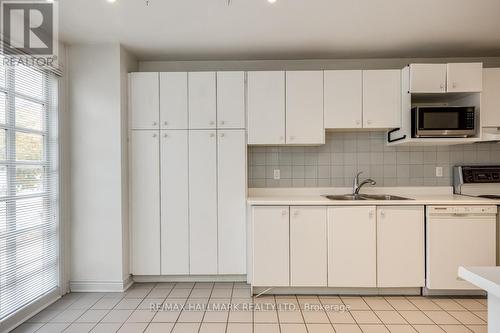 106 Roslin Avenue, Toronto, ON - Indoor Photo Showing Kitchen With Double Sink