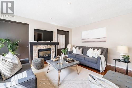 77 Ashbury Boulevard, Ajax, ON - Indoor Photo Showing Living Room With Fireplace