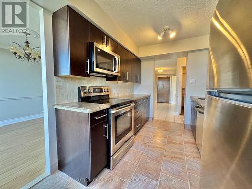 712 - 5280 Lakeshore Road, Burlington, ON - Indoor Photo Showing Kitchen With Stainless Steel Kitchen