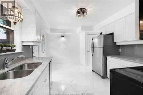 420 Eastlawn, Windsor, ON - Indoor Photo Showing Kitchen With Double Sink