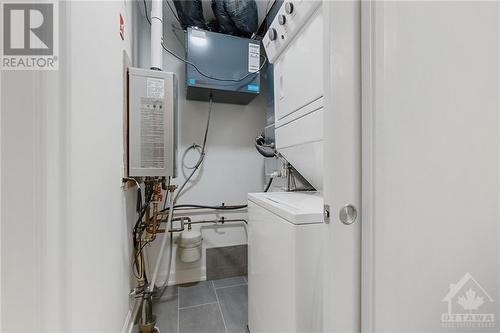 Laundry/Utility Room with access from 2pc bath - 511 Gladstone Avenue Unit#5, Ottawa, ON - Indoor Photo Showing Laundry Room