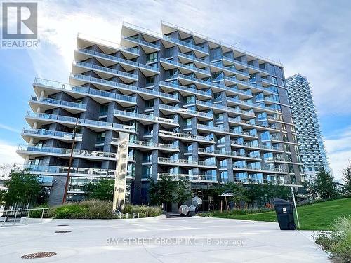 319 - 1 Edgewater Drive, Toronto, ON - Outdoor With Balcony With Facade