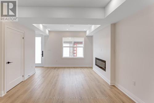 Lane - 706 Gladstone Avenue, Toronto, ON - Indoor Photo Showing Other Room With Fireplace