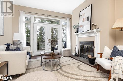 311 Grandview Hilltop Drive Unit# 3, Huntsville, ON - Indoor Photo Showing Living Room With Fireplace