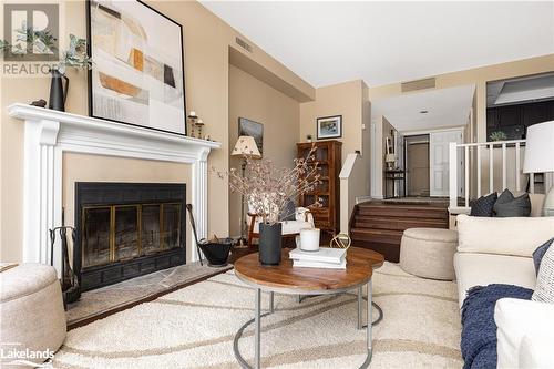 311 Grandview Hilltop Drive Unit# 3, Huntsville, ON - Indoor Photo Showing Living Room With Fireplace