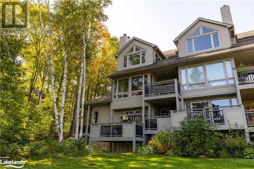 Beautiful Corner unit (far right) with forested views and privacy! - 311 Grandview Hilltop Drive Unit# 3, Huntsville, ON - Outdoor With Balcony With Facade