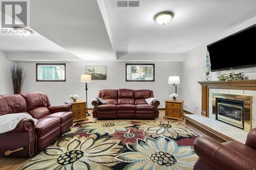 654 Classic Drive, London, ON - Indoor Photo Showing Living Room With Fireplace