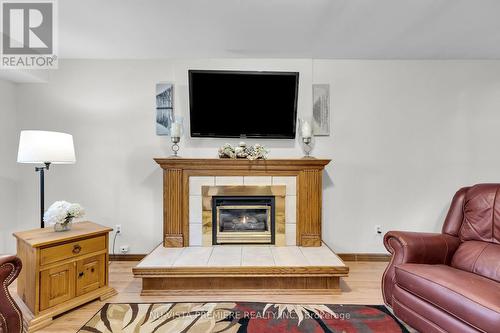 654 Classic Drive, London, ON - Indoor Photo Showing Living Room With Fireplace