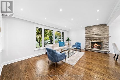 66 Lloydminster Crescent, Toronto, ON - Indoor Photo Showing Living Room With Fireplace