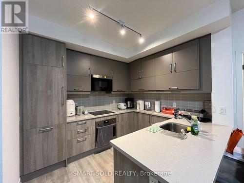 504 - 38 Simcoe Promenade, Markham, ON - Indoor Photo Showing Kitchen With Upgraded Kitchen