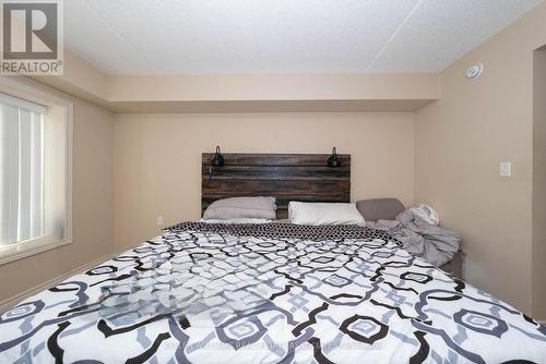 110 - 1440 Main Street E, Milton, ON - Indoor Photo Showing Bedroom