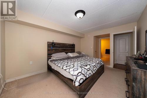 110 - 1440 Main Street E, Milton, ON - Indoor Photo Showing Bedroom