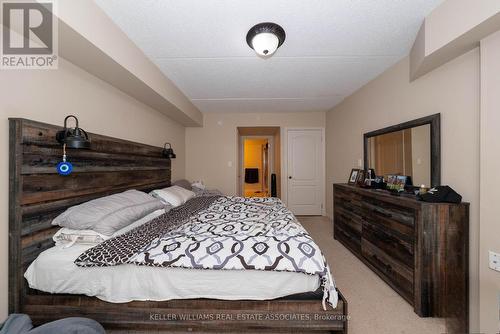 110 - 1440 Main Street E, Milton, ON - Indoor Photo Showing Bedroom