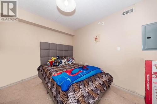 110 - 1440 Main Street E, Milton, ON - Indoor Photo Showing Bedroom