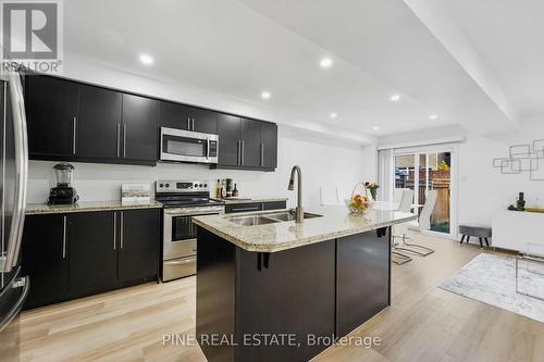 45 Waterbridge Street, Hamilton, ON - Indoor Photo Showing Kitchen With Double Sink With Upgraded Kitchen