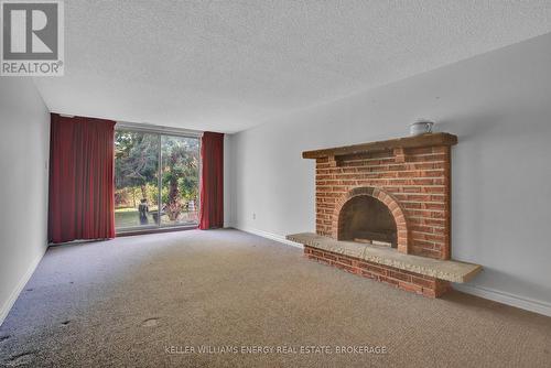 28 Morgandale Crescent, Clarington (Bowmanville), ON - Indoor Photo Showing Living Room With Fireplace