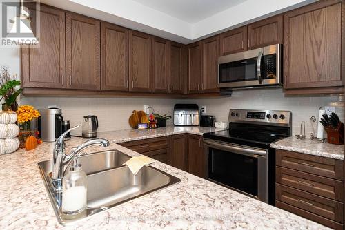 540 Bellflower Court, Milton, ON - Indoor Photo Showing Kitchen With Stainless Steel Kitchen With Double Sink