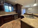 208 Willow Drive, Tumbler Ridge, BC  - Indoor Photo Showing Kitchen With Double Sink 