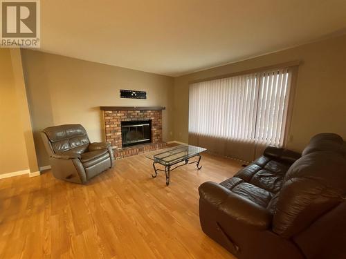 208 Willow Drive, Tumbler Ridge, BC - Indoor Photo Showing Living Room With Fireplace