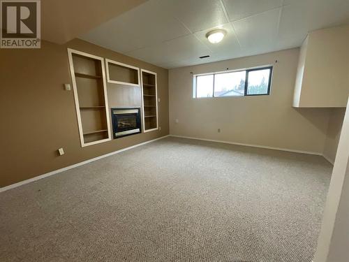 208 Willow Drive, Tumbler Ridge, BC - Indoor Photo Showing Other Room With Fireplace