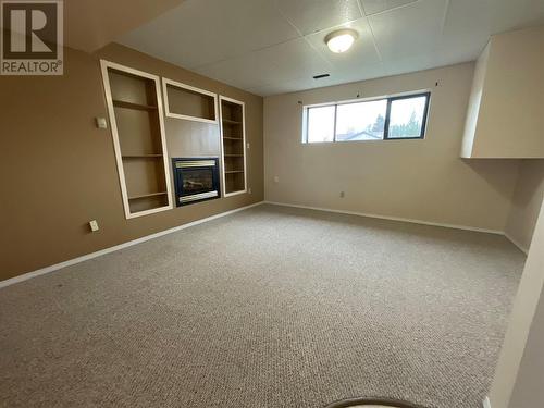 208 Willow Drive, Tumbler Ridge, BC - Indoor Photo Showing Other Room With Fireplace