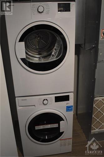 180 George Street Unit#1304, Ottawa, ON - Indoor Photo Showing Laundry Room