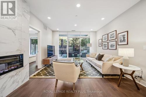 116 - 1575 Lakeshore Road W, Mississauga, ON - Indoor Photo Showing Living Room With Fireplace