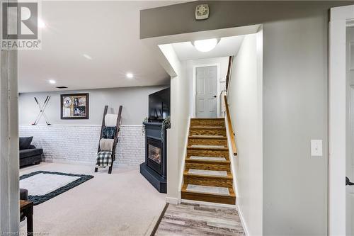 435 Lampman Place, Woodstock, ON - Indoor With Fireplace