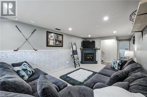 435 Lampman Place, Woodstock, ON - Indoor With Fireplace