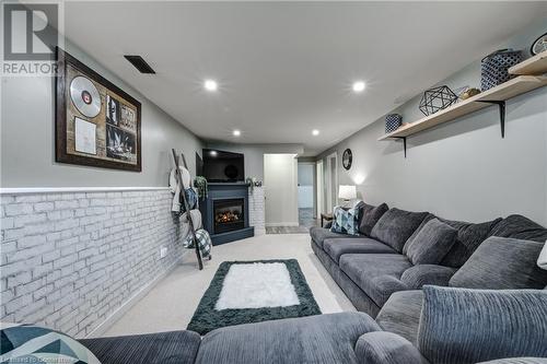 435 Lampman Place, Woodstock, ON - Indoor Photo Showing Living Room With Fireplace