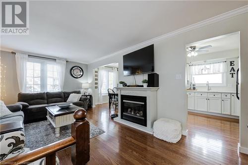 435 Lampman Place, Woodstock, ON - Indoor Photo Showing Living Room With Fireplace