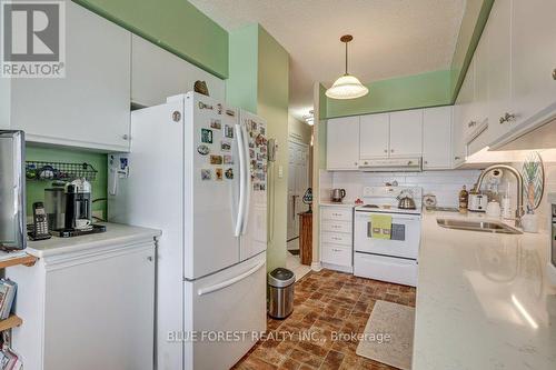 707 - 744 Wonderland Road S, London, ON - Indoor Photo Showing Kitchen With Double Sink