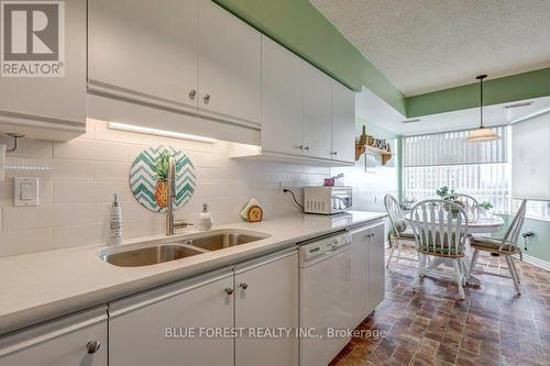 707 - 744 Wonderland Road S, London, ON - Indoor Photo Showing Kitchen With Double Sink