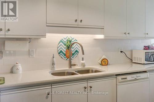 707 - 744 Wonderland Road S, London, ON - Indoor Photo Showing Kitchen With Double Sink